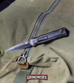 Smith & Wesson Spring Assisted Finger Actuator Spear Point OTF - Black Serr 17 Smith & Wesson Spring Assisted Finger Actuator Spear Point OTF - Black Serr -Best Knifes Shop MP OTF Spring Assisted Spear Point Knife Gray Black BHQ 80731 kp lifestyle web large 1