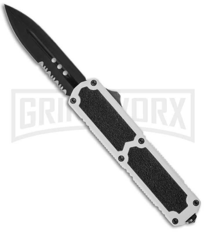 Titan White D/A OTF Automatic Knife - Dagger Black Serr 3 Titan White D/A OTF Automatic Knife - Dagger Black Serr